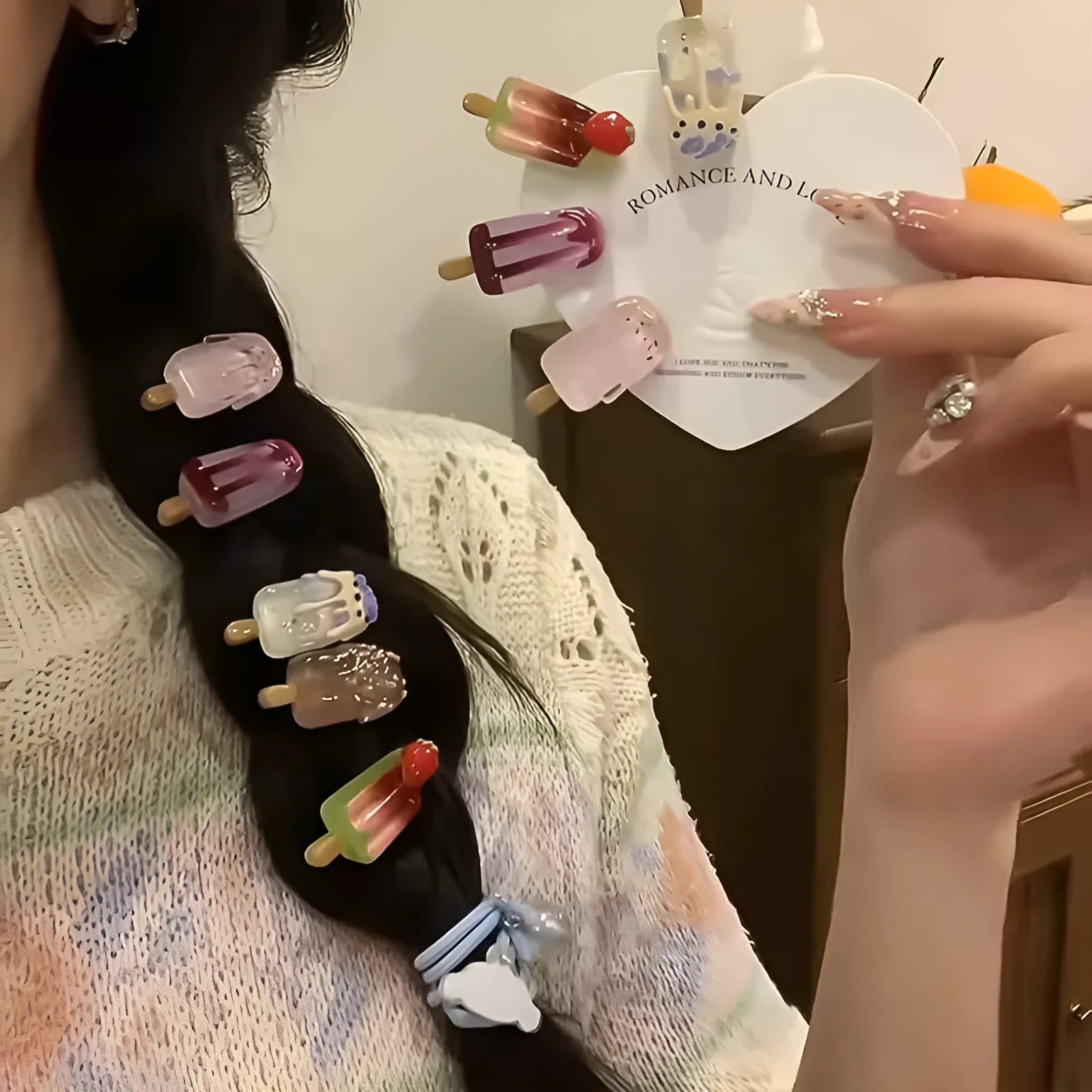 Resin ice cream design hair barrette with side clip fastening.