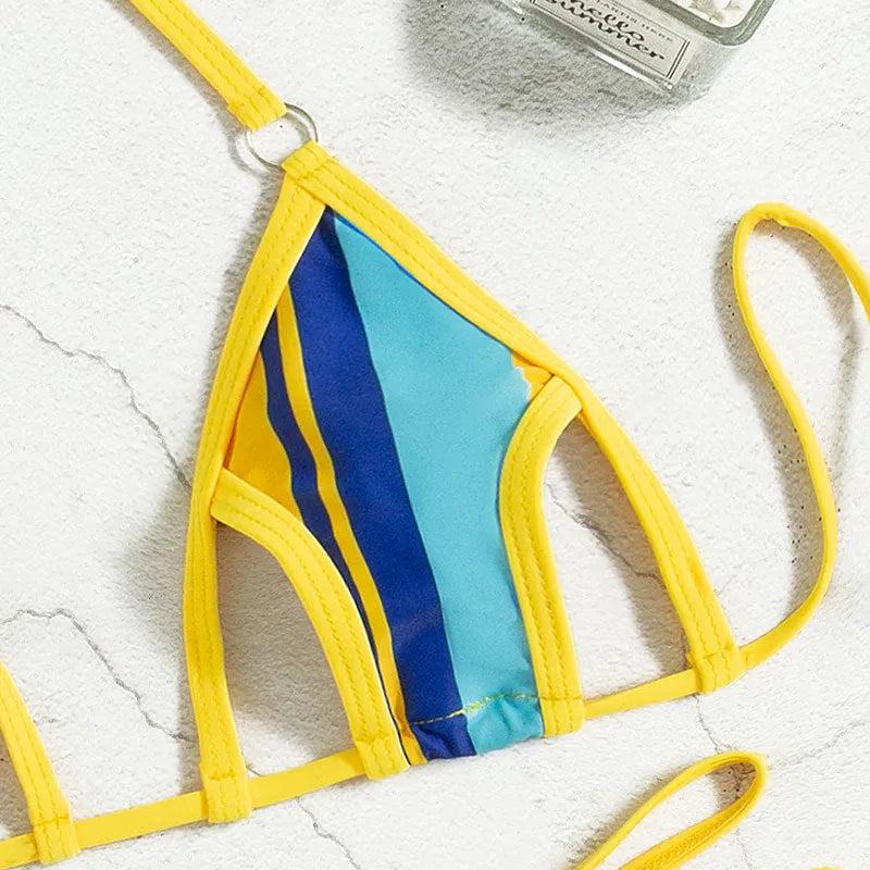 Yellow women's split swimsuit with neck-hanging style and hollow backless design