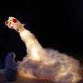 DIY astronaut rocket night light kit with LED string lights and build materials on a desktop
