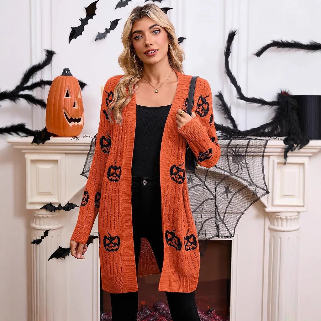 Women's black Halloween cardigan with orange Jacquard pumpkin head pattern on the front.