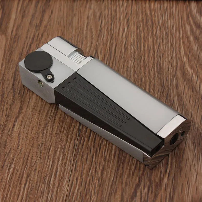 Silver foldable metal pipe lighter shown open, revealing the lighter mechanism and a small stash compartment.