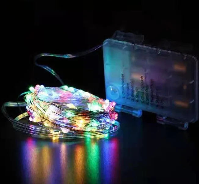 12 metre copper wire LED string lights with 120 bulbs in battery-powered light post