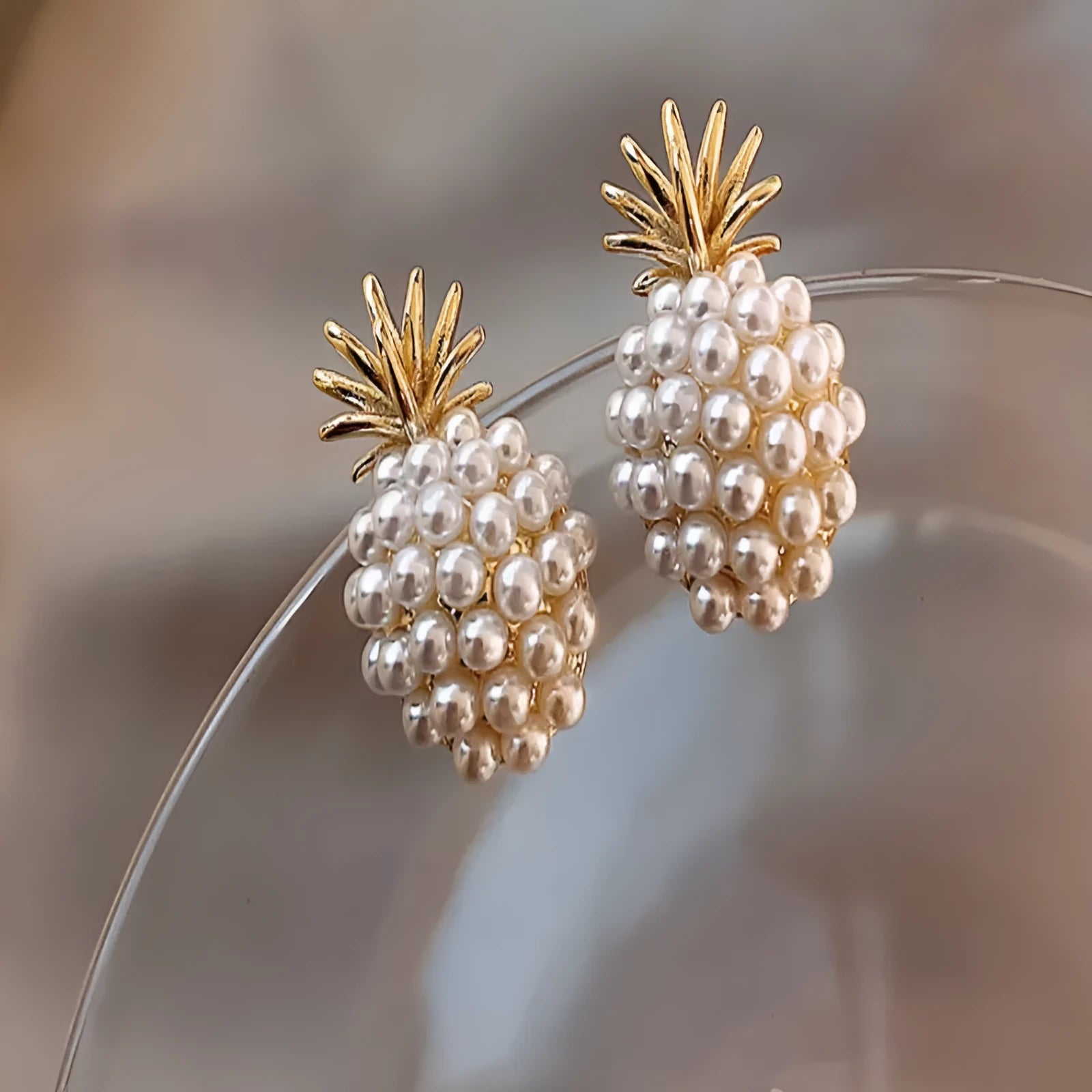 Korean-style alloy fruit earrings with inlaid stones in gold, pearl flower, silver, or starfish pearl finishes.