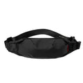 Men's black Oxford cloth crossbody waist pack showing interior phone and ID pockets