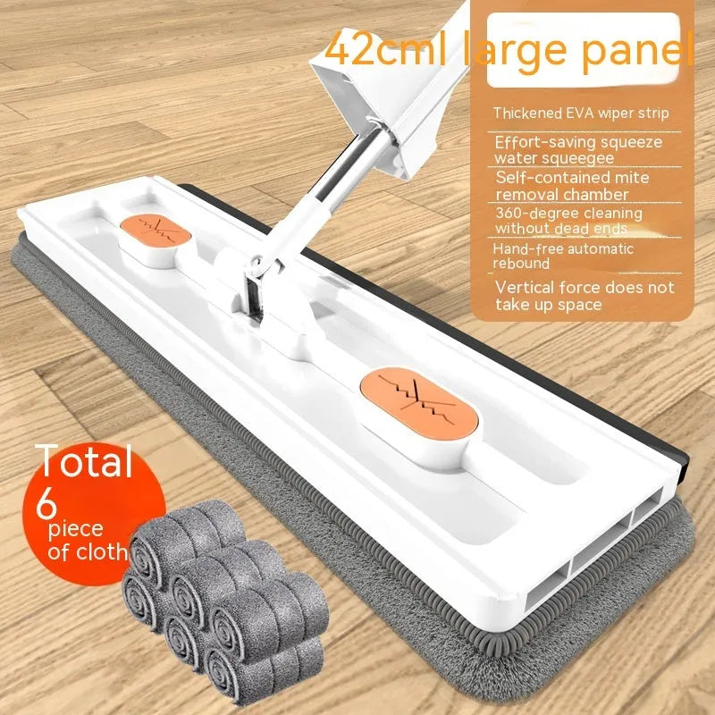 Large flat mop with blue cloth on a wooden floor, showing its 360-degree rotating head and long stainless steel handle.