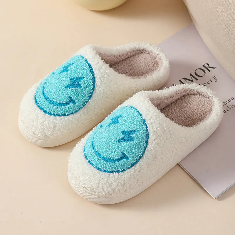 Women's plush cartoon love style home slippers with a non-slip PVC sole.