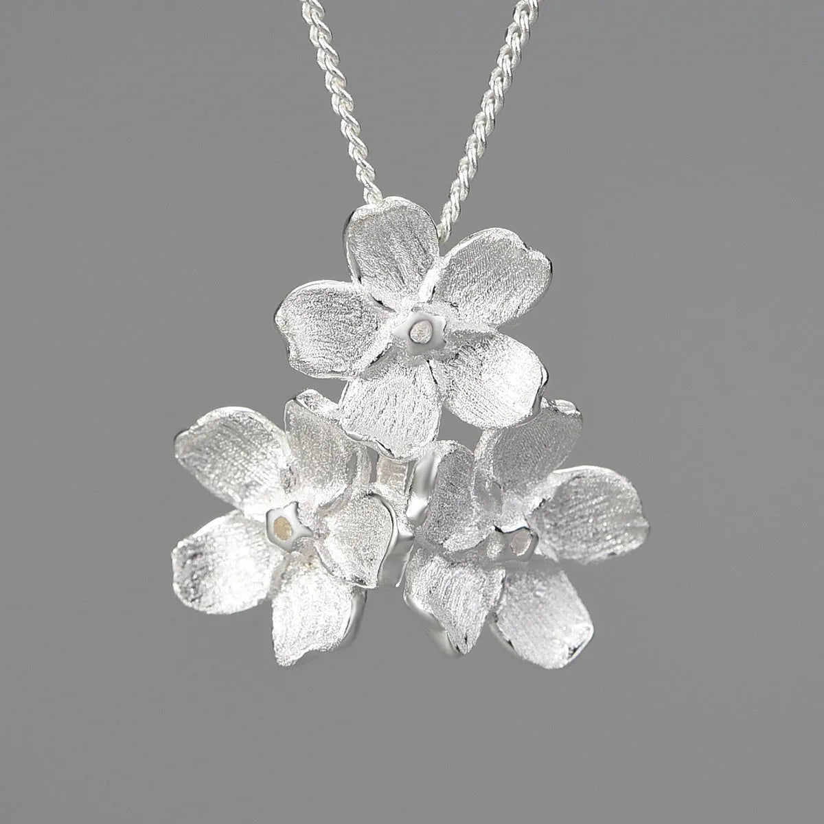 Myosotis Sylvatica sterling silver floral pendant with pastoral design in gold or silver electroplated finishes