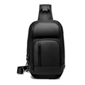 Black PVC outdoor shoulder bag showing computer pocket, air cushion strap, and organisational compartments