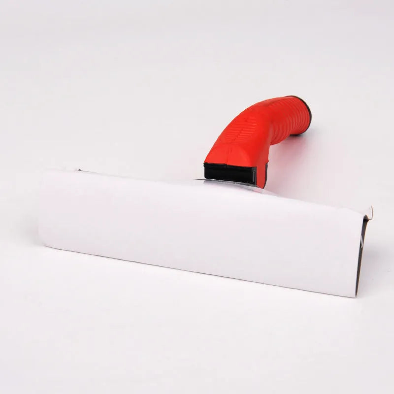 Large red dog comb with rubber handle and alloy steel teeth on surface