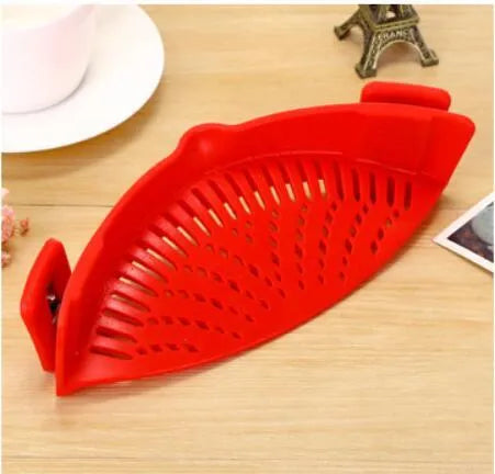 Silicone clip-on kitchen funnel strainer for draining liquids from pots with buckle attachment