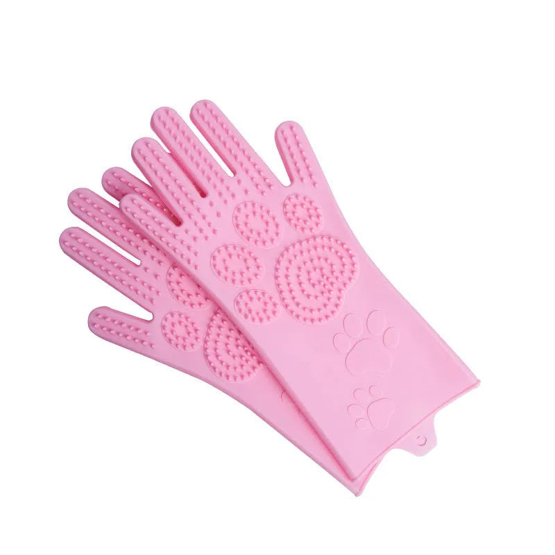 Blue silicone scrubbing gloves showing textured palm and finger surfaces for cleaning