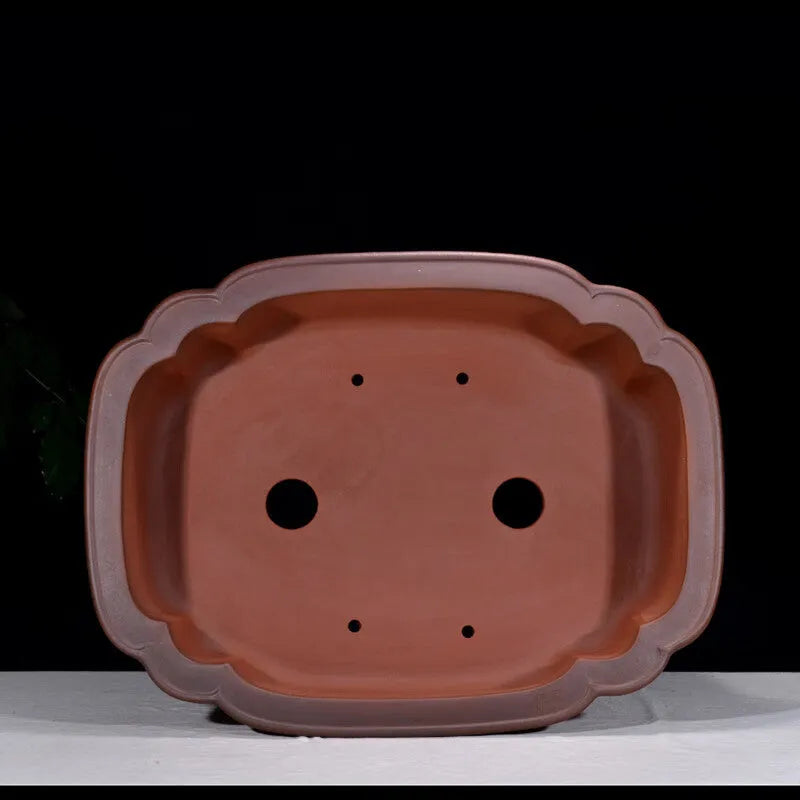 Large antique-style rectangular purple clay flower pot with Chinese design elements.