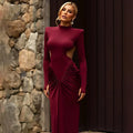 Women's long sleeve backless dress with high collar and pleated detailing in slim fit silhouette