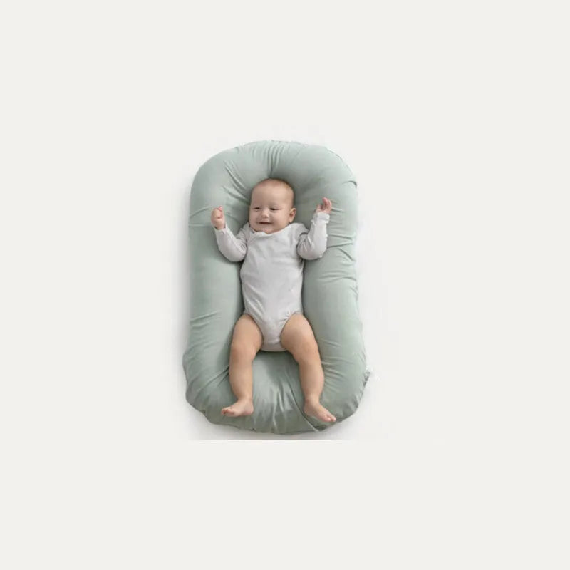 Portable cotton baby nest crib measuring 75x45cm with PP cotton filler in beige colour
