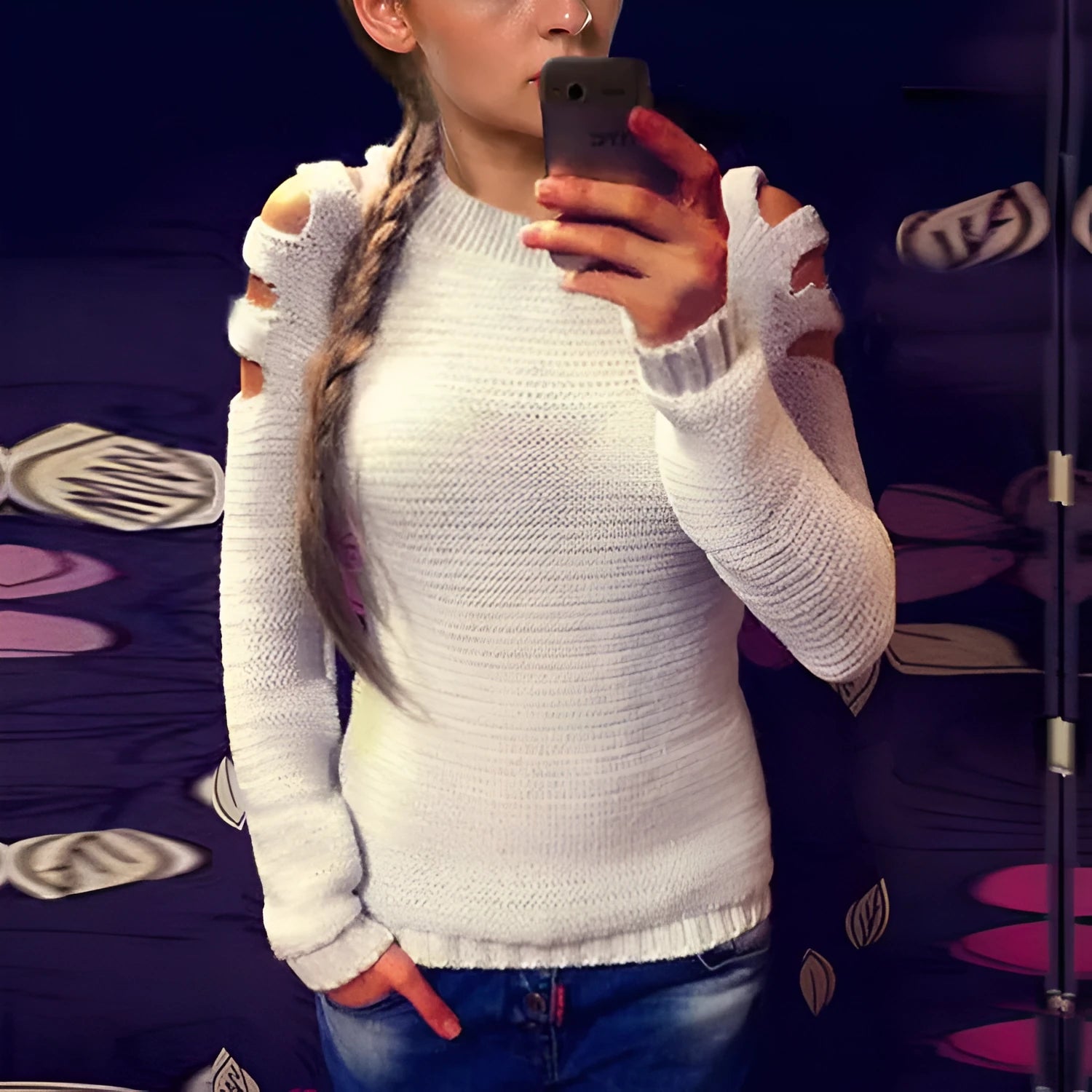 White women's knitted shirt with hollow-out sleeves and round neck