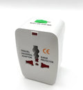 White universal travel plug converter showing UK and European sockets, with dimensions 73mm by 50mm by 39mm.