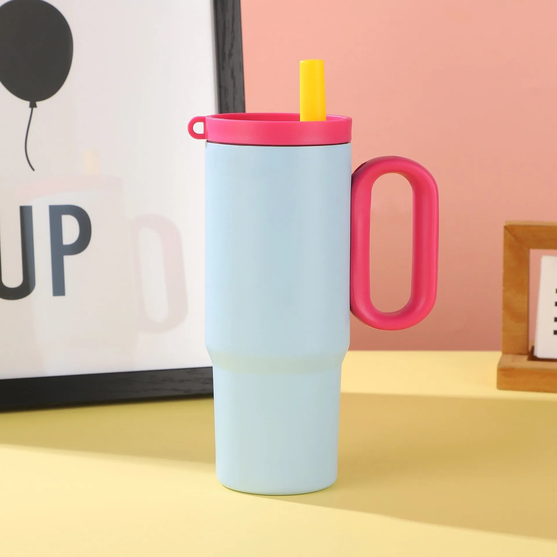 DIY Vitality large insulated straw cup with handle in black, pink, blue, white, or yellow.