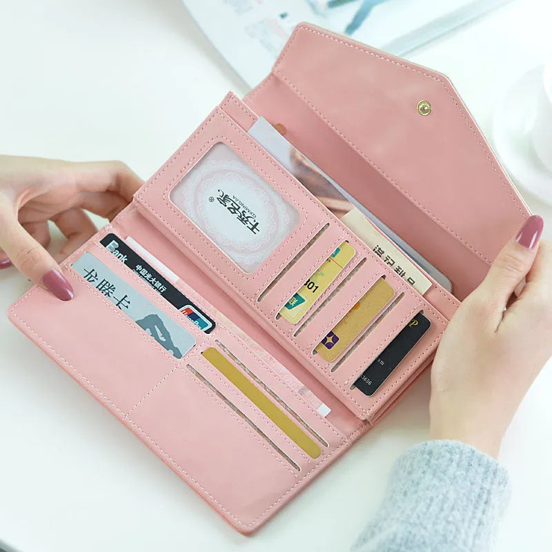 Women's three-fold PU leather student wallet with a clip closure, shown in multiple colour options