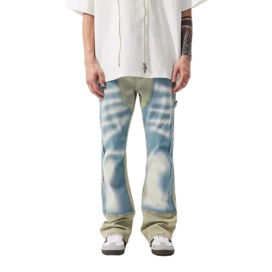 Yellow and blue retro patchwork jeans with splash-ink damaged design, mid-waist cut with zip fly