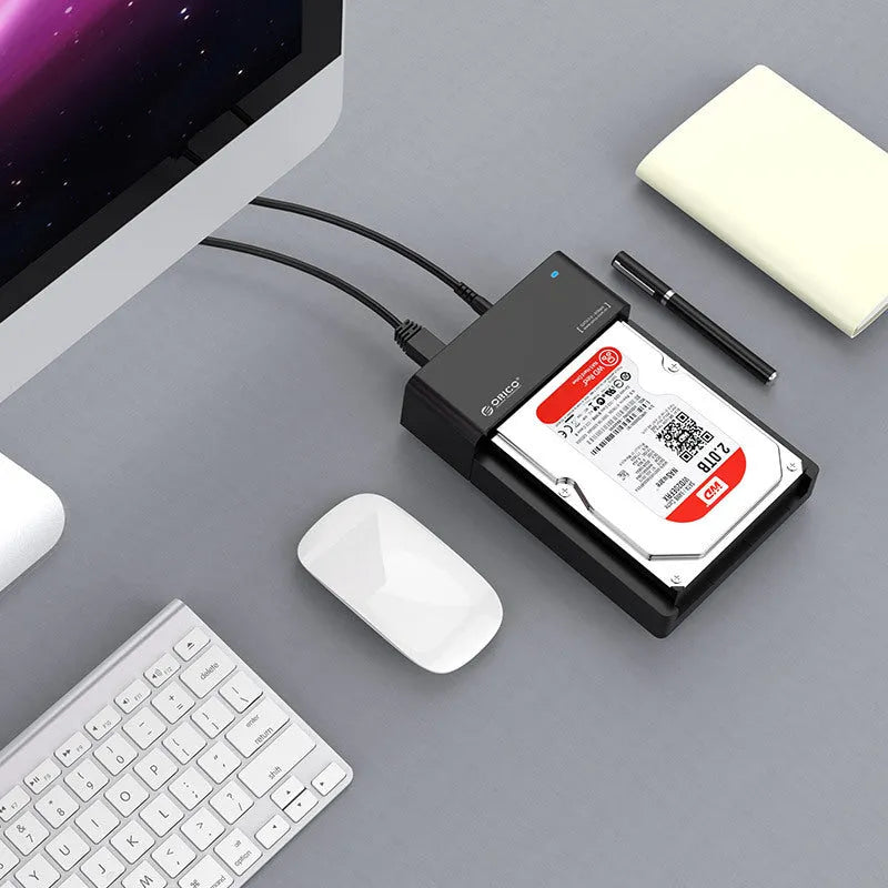 Black universal mobile hard disk box for 2.5 inch SATA drives with USB data cable