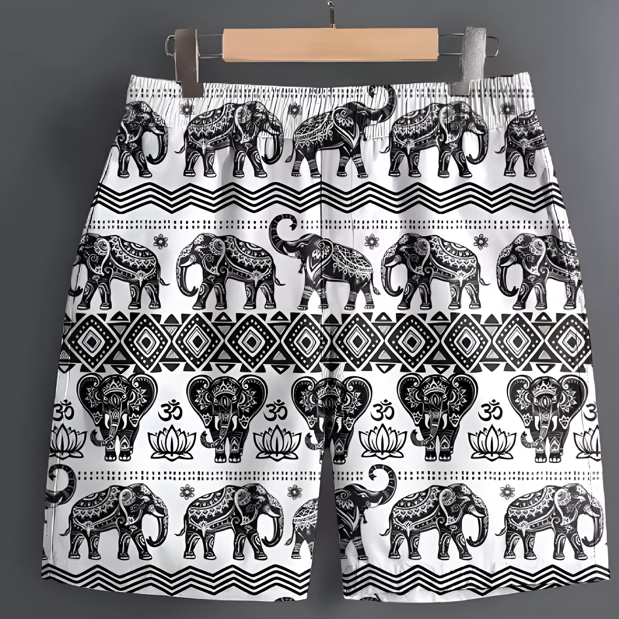 Men's casual polyester shorts in camouflage pattern, laid flat showing waistband and leg.