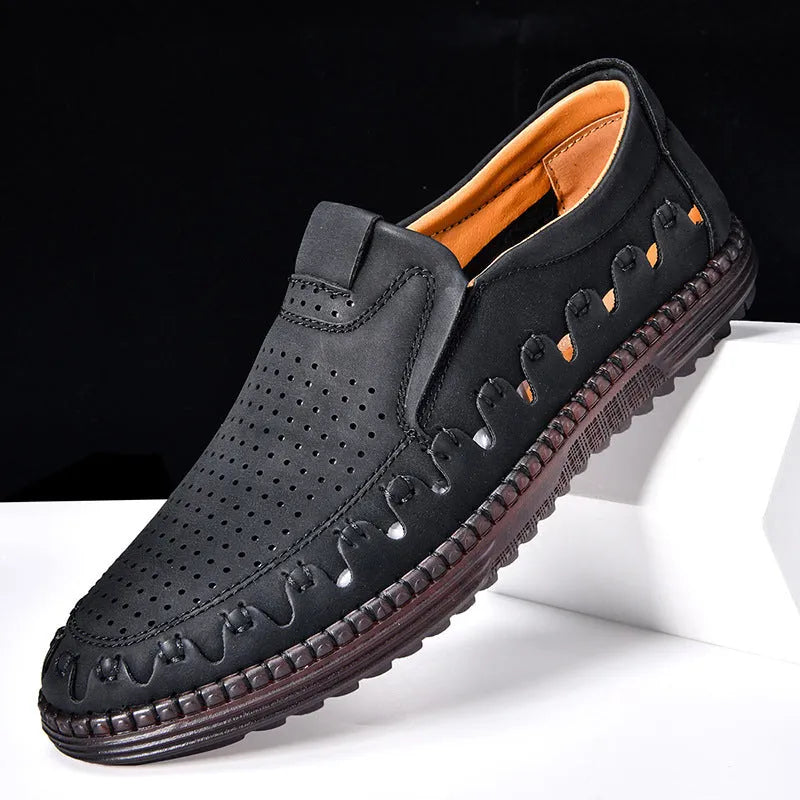 Men's brown casual slip-on shoes with round toe, flat heel, and sewn sole detailing.