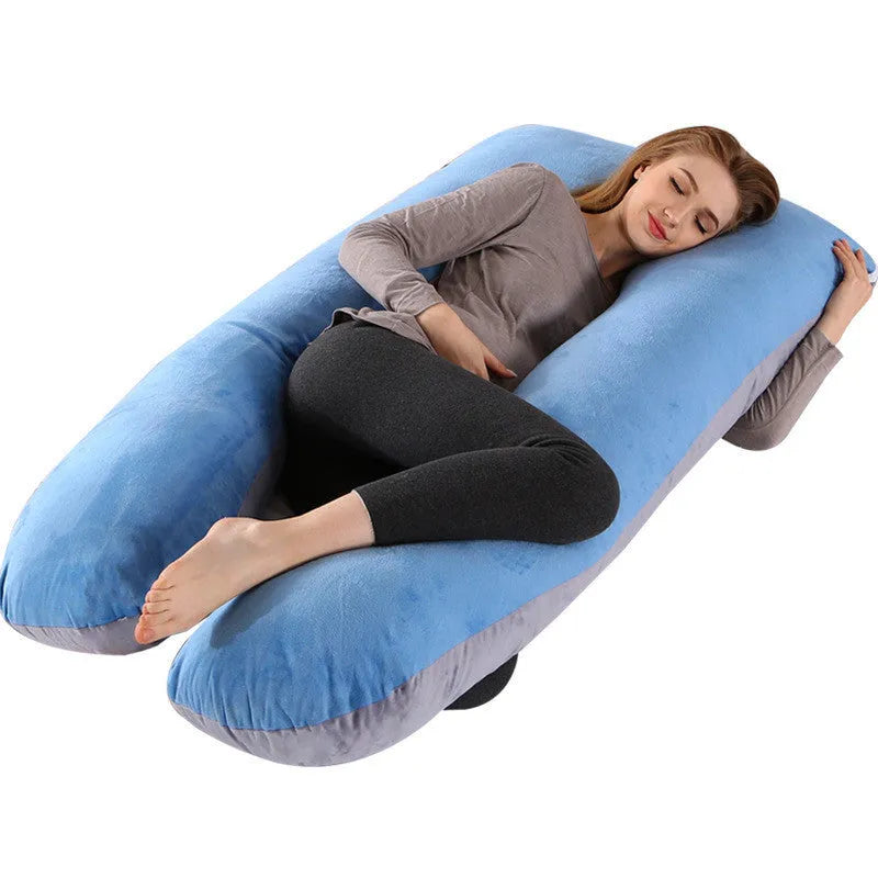Large U-shaped pregnancy support pillow with removable cover in choice of fabrics.