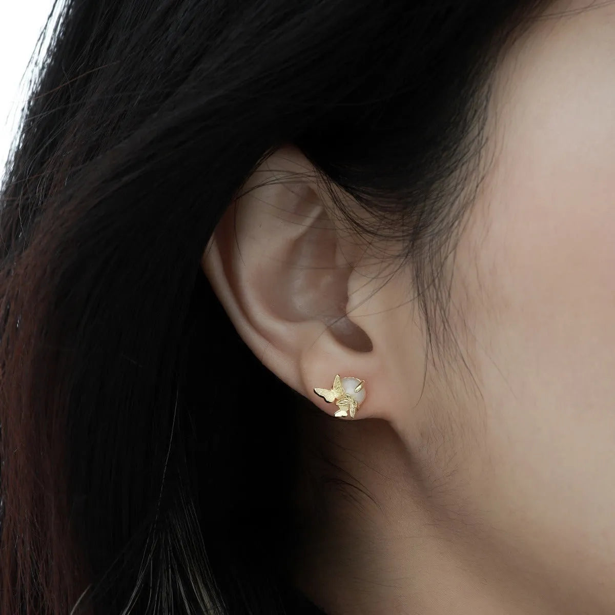 Butterfly design ear studs in 925 silver with electroplated gold or white gold colour finishes