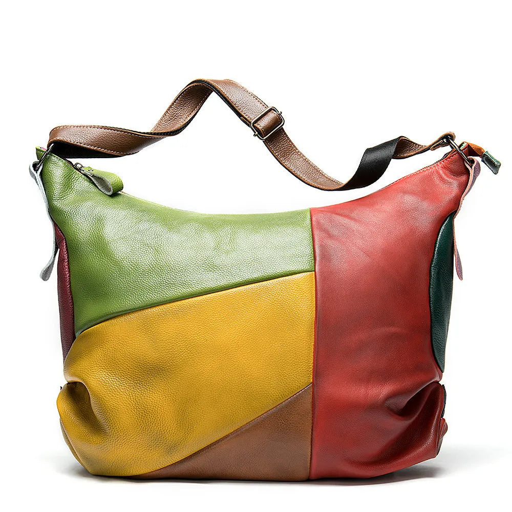 Brown hand-stitched cowhide leather travel bag shown as a crossbody bag.