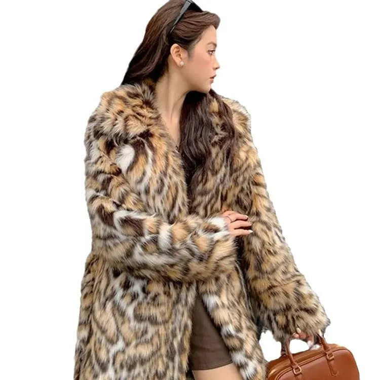 A woman wearing a long plush faux fur coat with a detachable fur collar and pockets, shown in a street fashion setting.