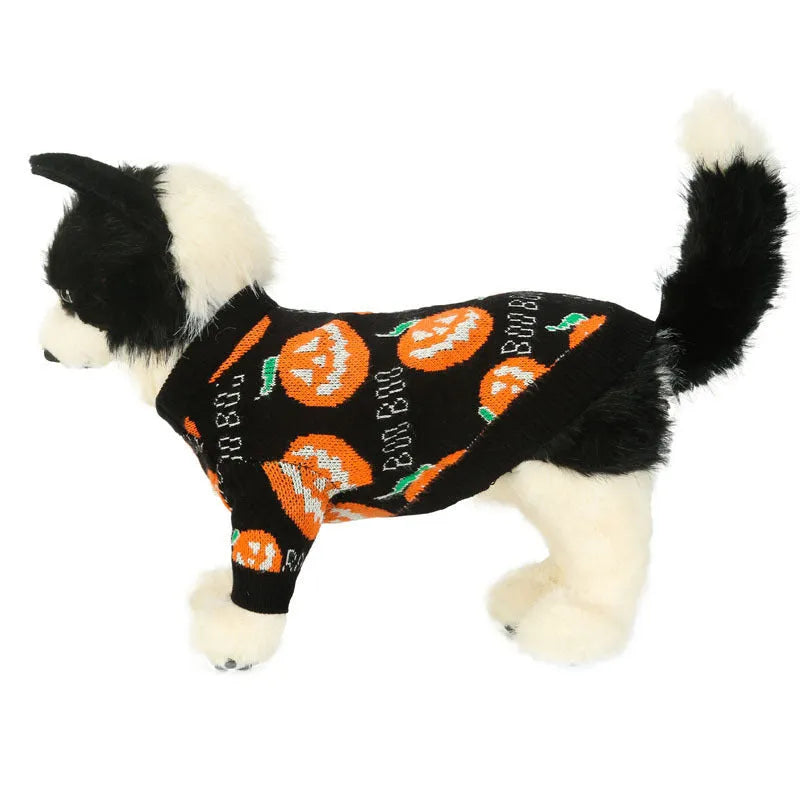 Black dog sweater with orange pumpkin print for Halloween, shown on a mannequin.