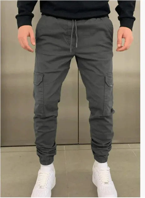 Men's polyester overalls with dimensional patch pockets and elastic waistband in straight leg baggy pants style