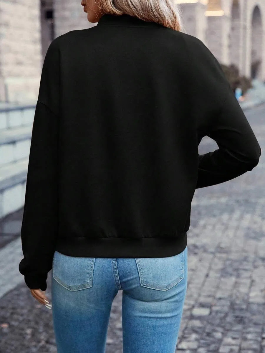 Women's black polyester zip jacket with long sleeves and faux pocket detailing