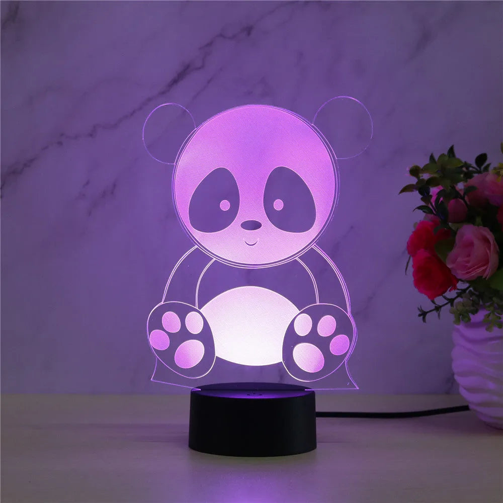 Panda-shaped acrylic night light with remote control displaying multiple colours on a black ABS base.