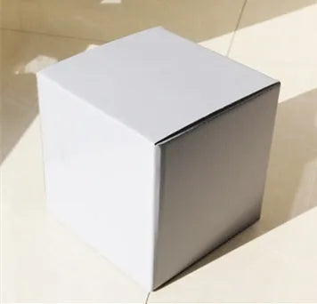 Square corrugated cardboard packaging box in black, shown in full stack carton construction.
