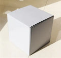 Square corrugated cardboard packaging box in black, shown in full stack carton construction.
