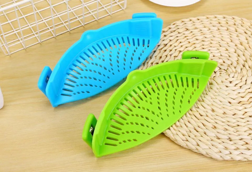 Silicone clip-on kitchen funnel strainer for draining liquids from pots with buckle attachment