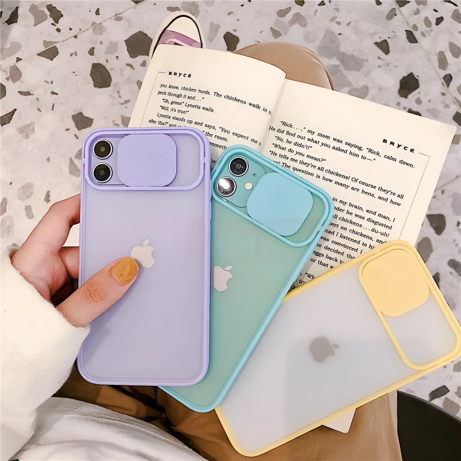 Frosted frame silicone phone case for iPhone in various colours including blue, pink, and black.
