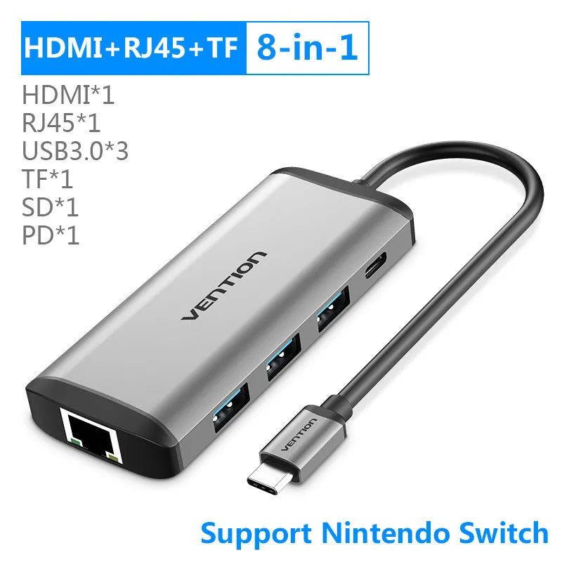 Deep grey USB-C to HDMI, USB 3.0, Ethernet, and card reader multi-port adapter with aluminium construction