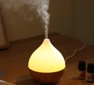 Asakusa wood grain finish vase-shaped aroma diffuser with USB cable.