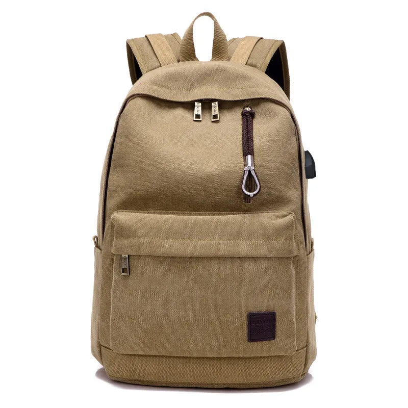 Canvas backpack with USB charging port showing computer pocket and available colour options