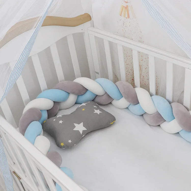 Braided knot crib bumper in spandex velvet, showing flexible length options for cot protection.