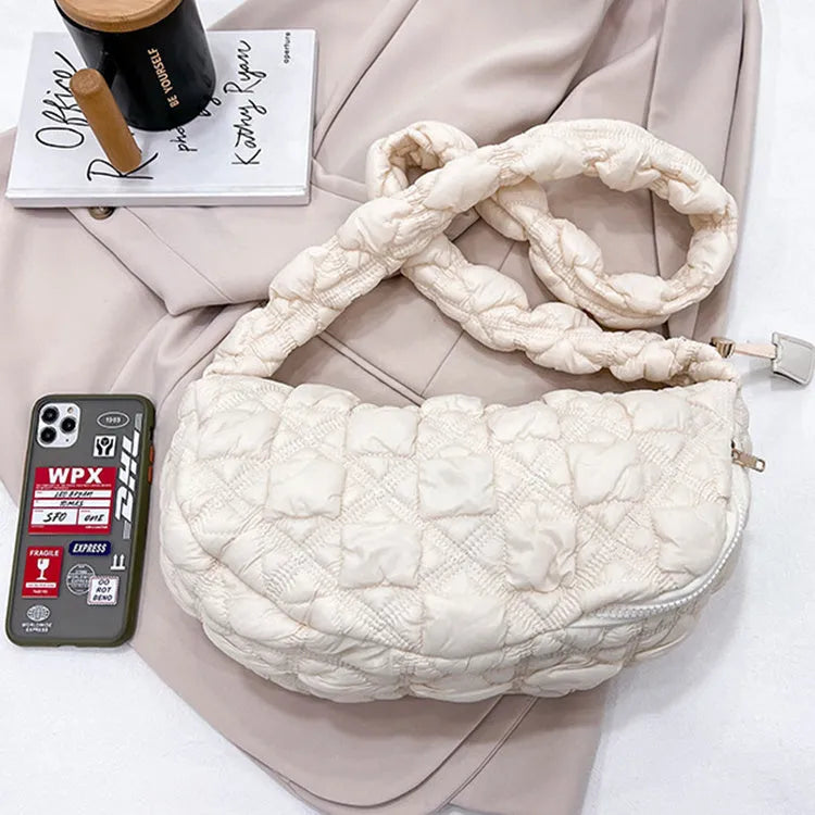 Women's nylon shoulder messenger bag in a solid colour with a long strap, showing front view.