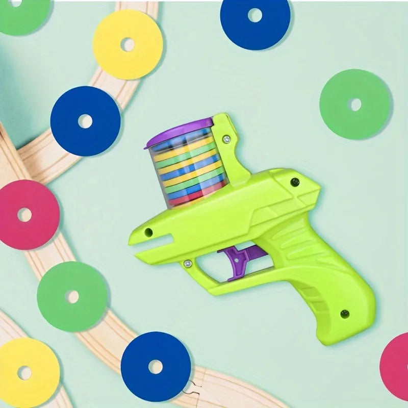Battery-free interactive cat toy launcher with colourful foam discs on purple base