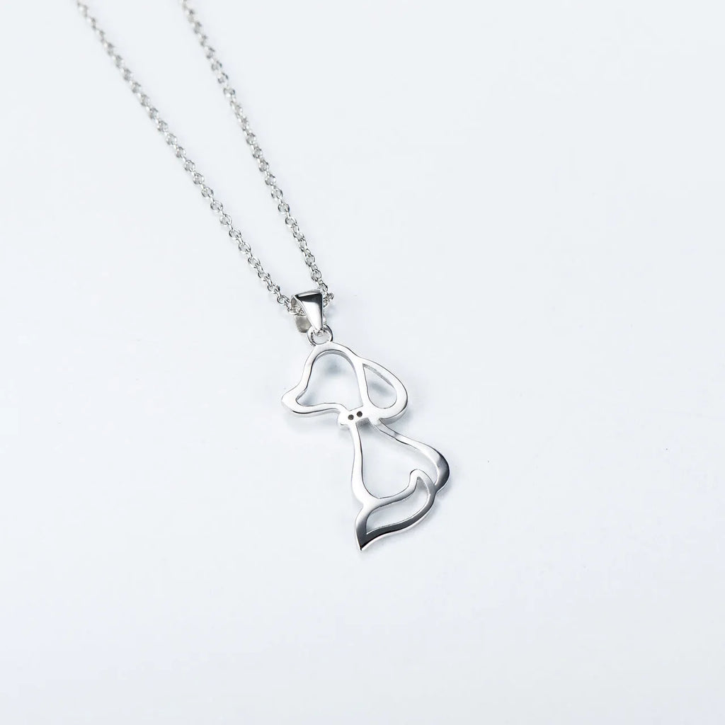 925 sterling silver dog pendant necklace with round bead chain on display