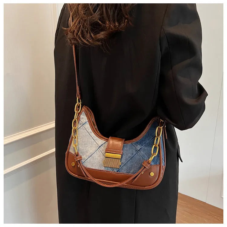 Brown denim women's shoulder bag with diamond mesh and chain details showing internal mobile phone pocket