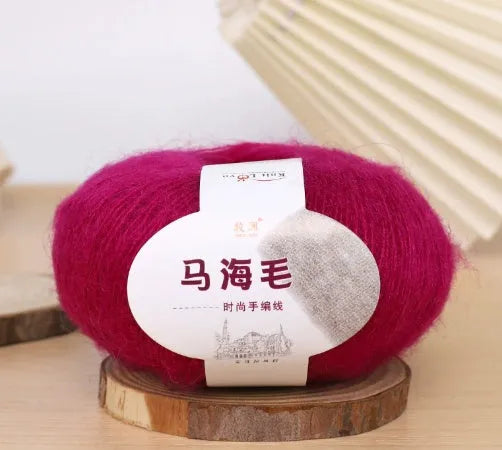 Mohair wool ball for DIY scarf knitting in assorted colours on white background