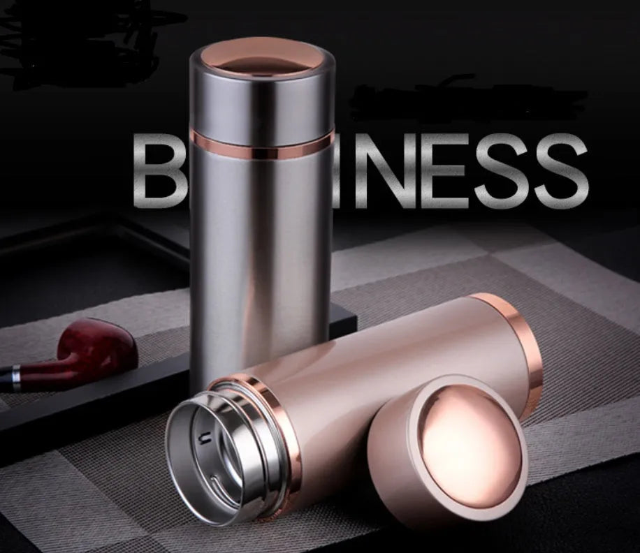 Stainless steel vacuum insulated thermo mug in gold finish with 380ml capacity and silver screw-top lid