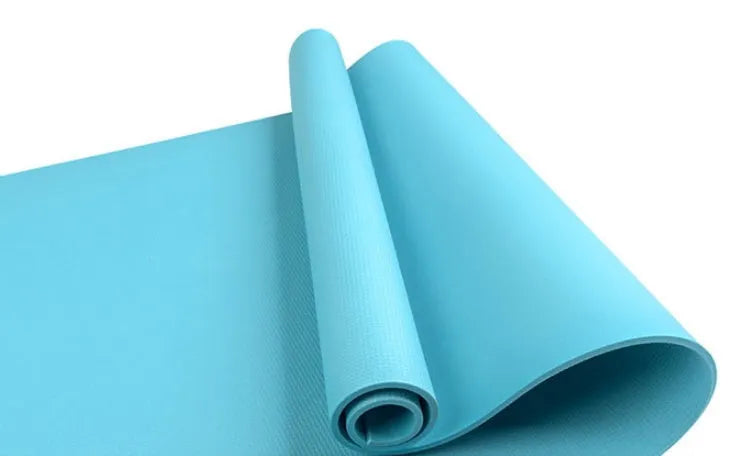 Red and blue EVA fitness yoga mats showing 4mm and 6mm thickness options on a wooden floor.