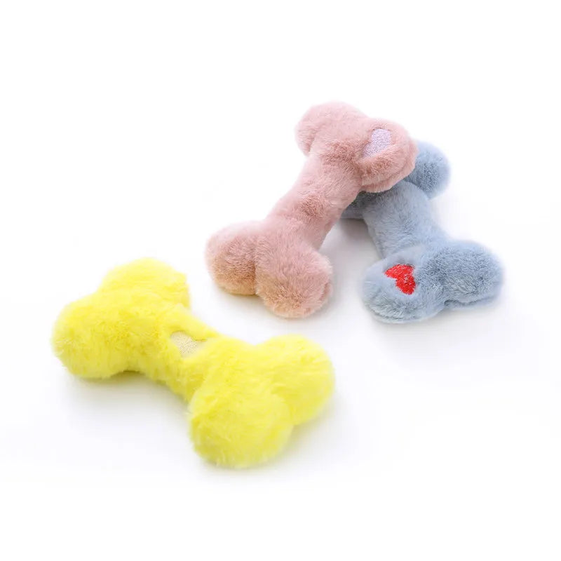 Cute love bone shaped plush dog toy with vocal squeaker in blue, pink, or yellow colours